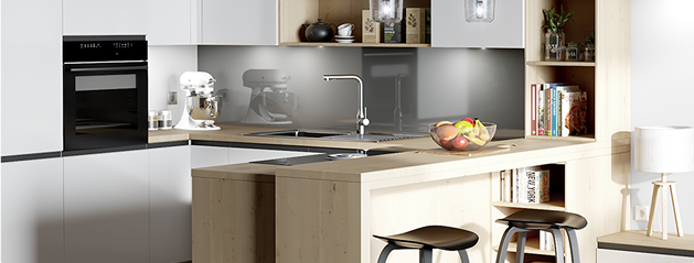 Cuisine moderne avec îlot central en bois clair, équipée d'un four encastré noir, un robot de cuisine blanc, et des tabourets noirs.